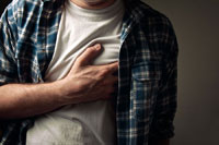 Man Experiencing Heartburn